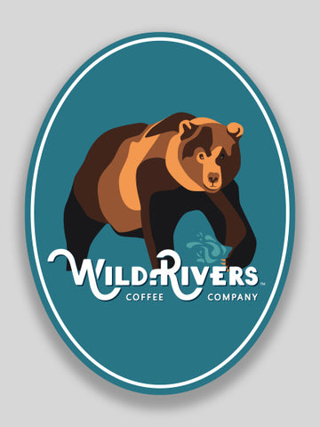 2.25 x 3 sticker of a bear and wild rivers logo on light blue background