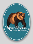 2.25 x 3 sticker of a bear and wild rivers logo on light blue background